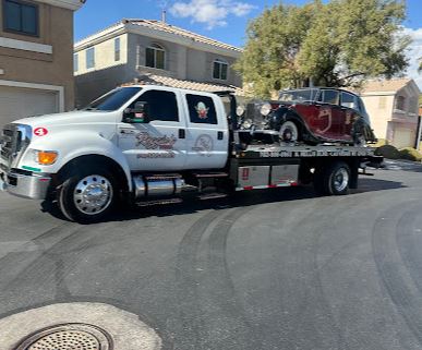 Reggies Towing LLC Cpcn 7450