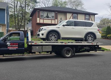 TUMI TOWING LLC